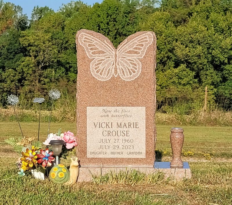 Crouse Red Granite Individual One Person Headstone with Butterfly Carving and Flower Vase